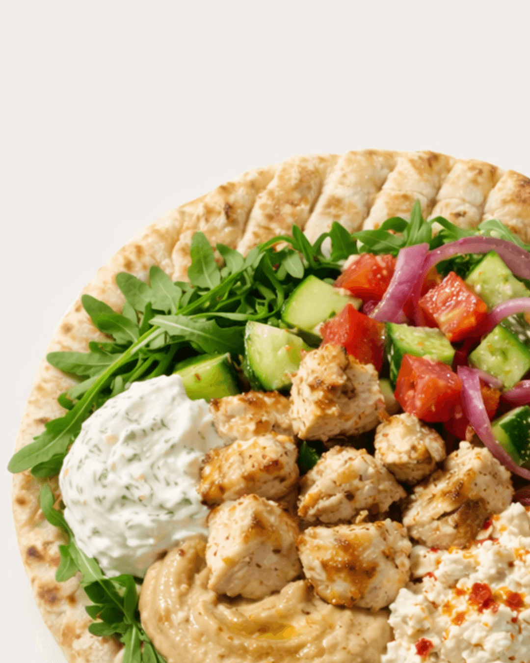 Authentic Greek pita bread being prepared
